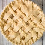 This braided lattice apple pie is packed with cinnamon apples tossed in a caramel sauce and sealed in a buttery, flaky pie crust with a braided lattice top. | aheadofthyme.com