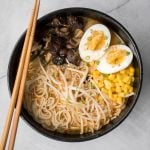 Vegetarian peanut miso ramen with a creamy vegan soup base, is topped with noodles, vegetables, and a perfect soft-boiled egg. Make it in just 20 minutes. | aheadofthyme.com