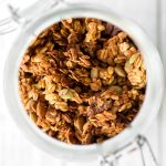 Quick and easy pumpkin pie granola packed with oats, pumpkin, pumpkin spice, and nuts, is vegan, gluten-free, and refined sugar-free. The best fall snack. | aheadofthyme.com