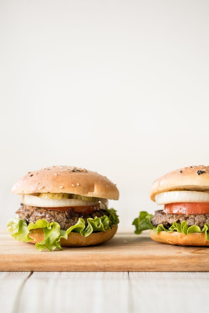 Super juicy and flavourful rosemary thyme quarter pound burgers made with fresh herbs add such an incredible depth of flavour. Just 10 minutes of prep work. | aheadofthyme.com