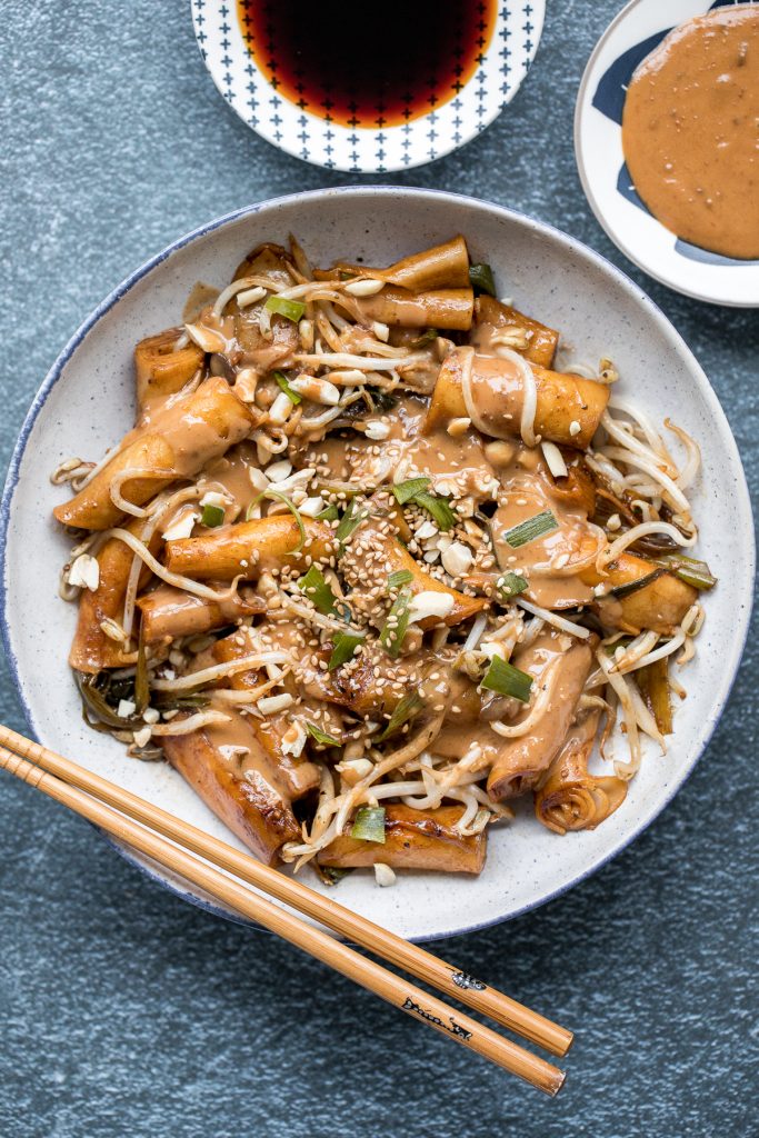 Better than takeout, quick and easy one pan stir-fried rice noodle rolls with peanut butter sauce is the best weeknight stir fry, ready in under 10 minutes. | aheadofthyme.com