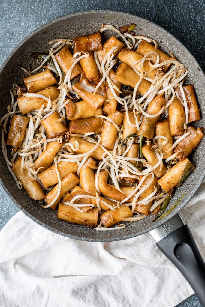 Better than takeout, quick and easy one pan stir-fried rice noodle rolls with peanut butter sauce is the best weeknight stir fry, ready in under 10 minutes. | aheadofthyme.com