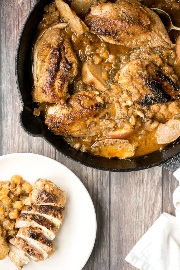 Quick, easy, one pan apple cider chicken with butternut squash, apples, and thyme, cooked in an apple cider sauce. Serve this fall meal in just 40 minutes. | aheadofthyme.com