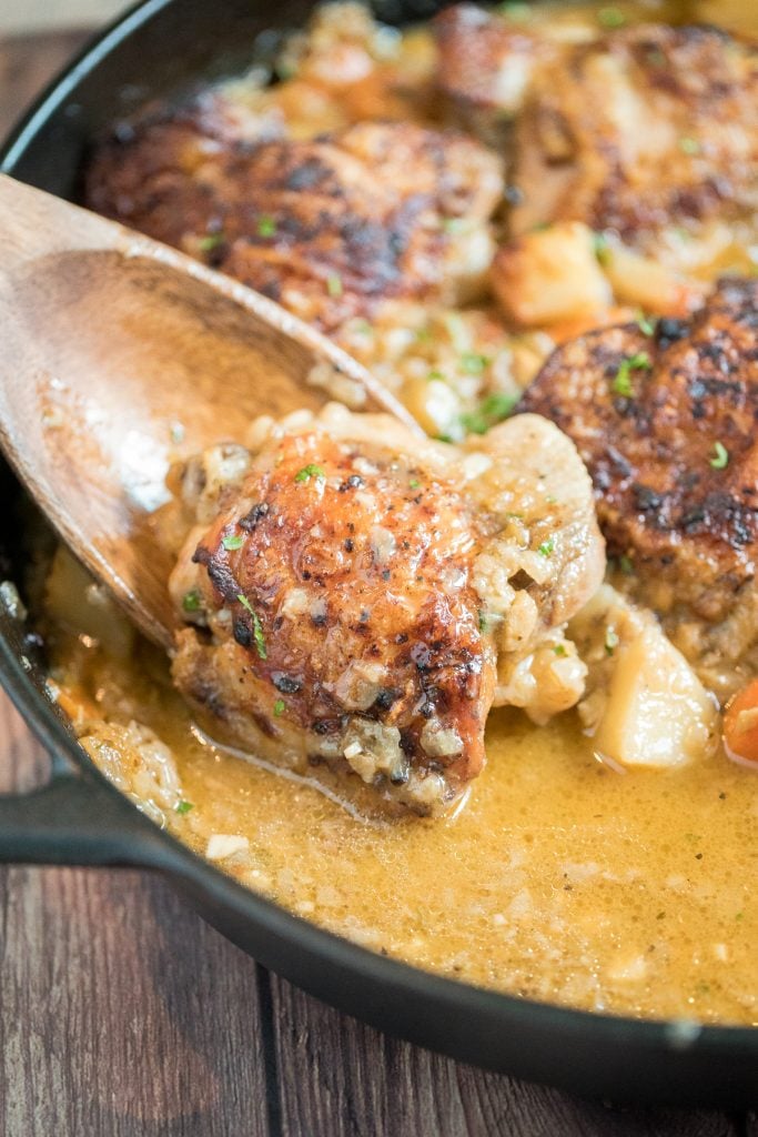 Tender and juicy apple dijon braised chicken thighs with potatoes is juicy, tender and so succulent that it falls off the bone, yet so crispy outside. | aheadofthyme.com