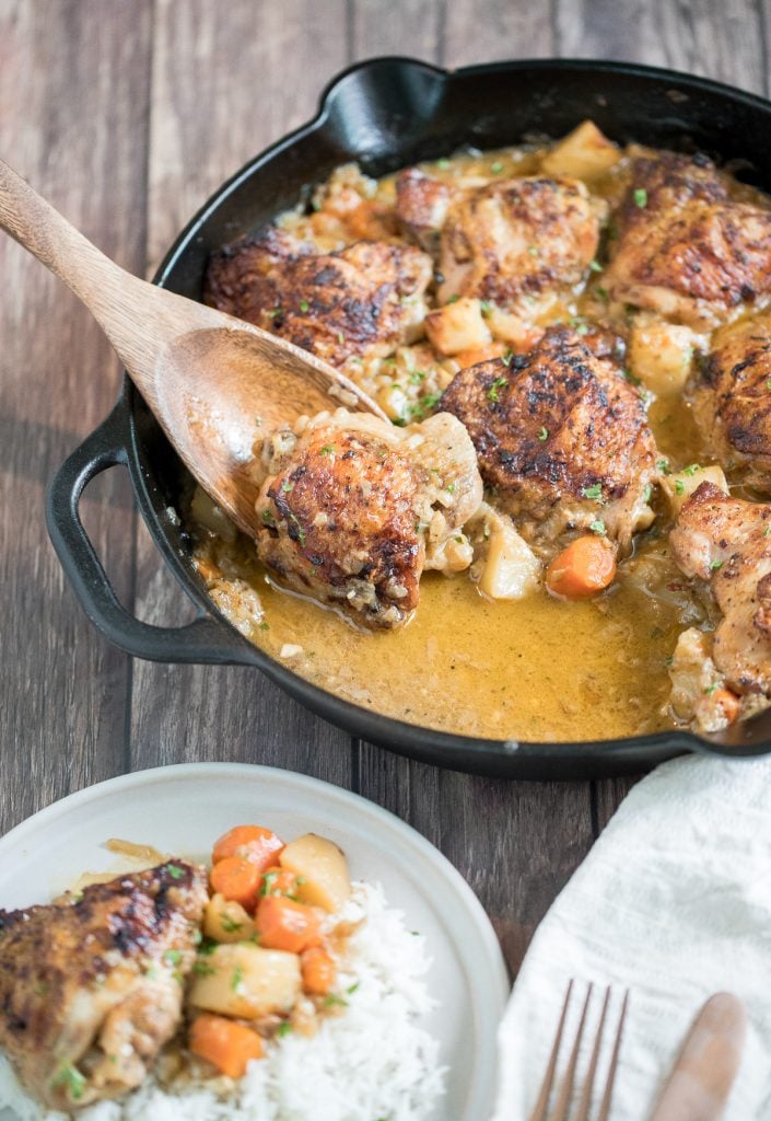 Tender and juicy apple dijon braised chicken thighs with potatoes is juicy, tender and so succulent that it falls off the bone, yet so crispy outside. | aheadofthyme.com