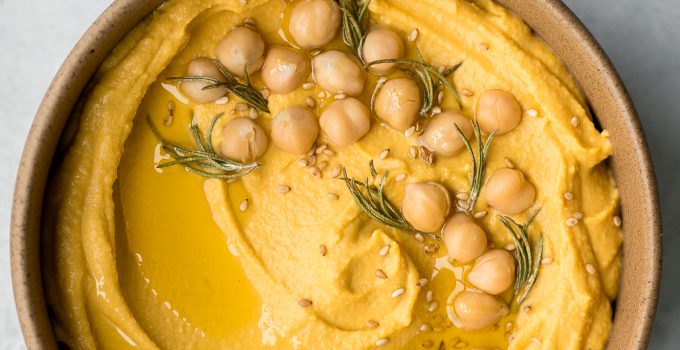 Make creamy pumpkin hummus in under 5 minutes with a few pantry staples including canned pumpkin. It's the best healthy and delicious fall snack or appy. | aheadofthyme.com