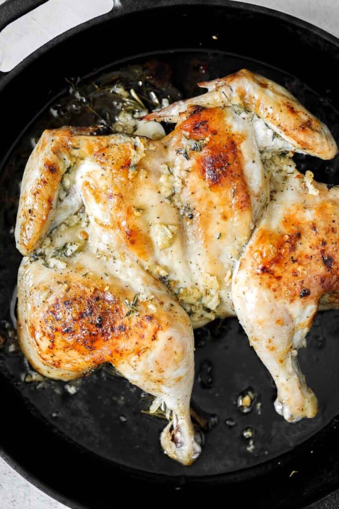 Roasted spatchcock chicken, also called butterflied chicken, cooks faster, stays juicy, and delivers perfectly crispy skin every time. | aheadofthyme.com