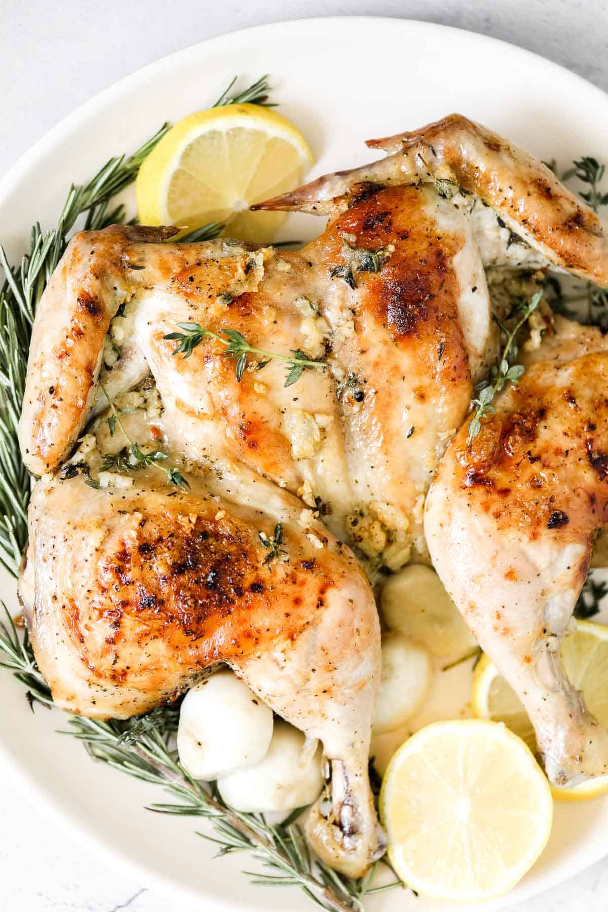 Roasted spatchcock chicken, also called butterflied chicken, cooks faster, stays juicy, and delivers perfectly crispy skin every time. | aheadofthyme.com