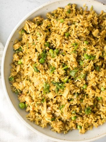 Flavourful curry chicken fried rice with chicken, mushrooms, peas, rice, and curry flavours is so easy to make in less than 10 minutes on busy weeknights. | aheadofthyme.com