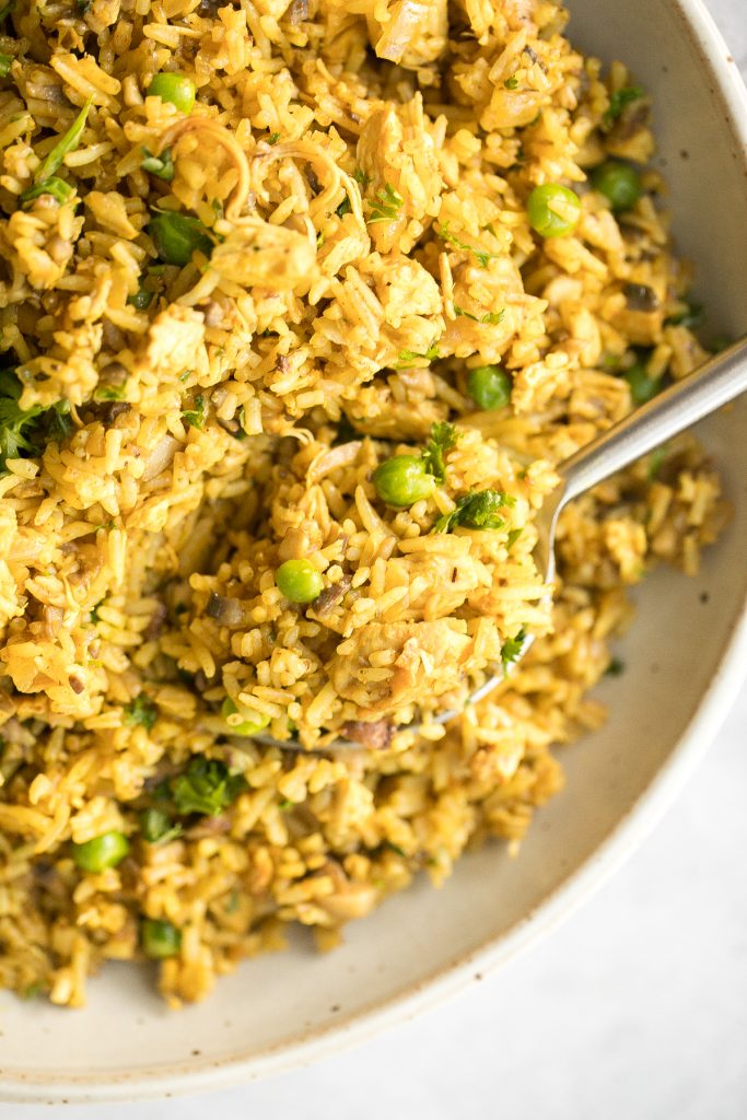 Flavourful curry chicken fried rice with chicken, mushrooms, peas, rice, and curry flavours is so easy to make in less than 10 minutes on busy weeknights. | aheadofthyme.com