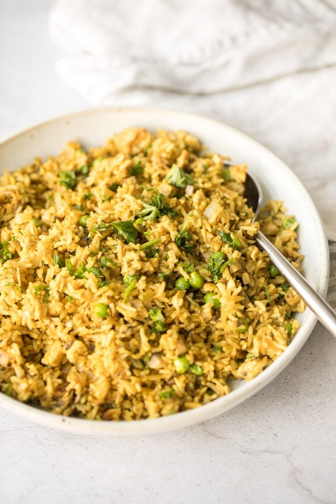 Flavourful curry chicken fried rice with chicken, mushrooms, peas, rice, and curry flavours is so easy to make in less than 10 minutes on busy weeknights. | aheadofthyme.com