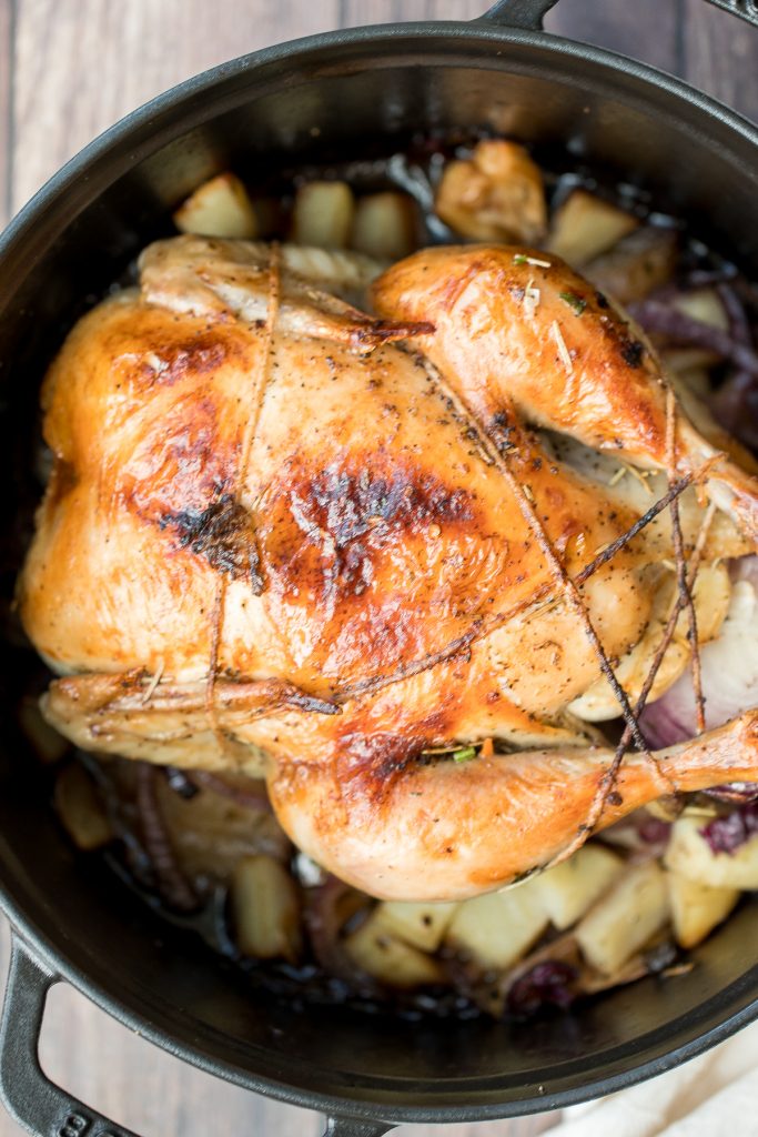 Easy Dutch oven whole roast chicken with the crispiest golden skin is juicy, tender and succulent and packed with flavour. Just takes 15 minutes to prep. | aheadofthyme.com