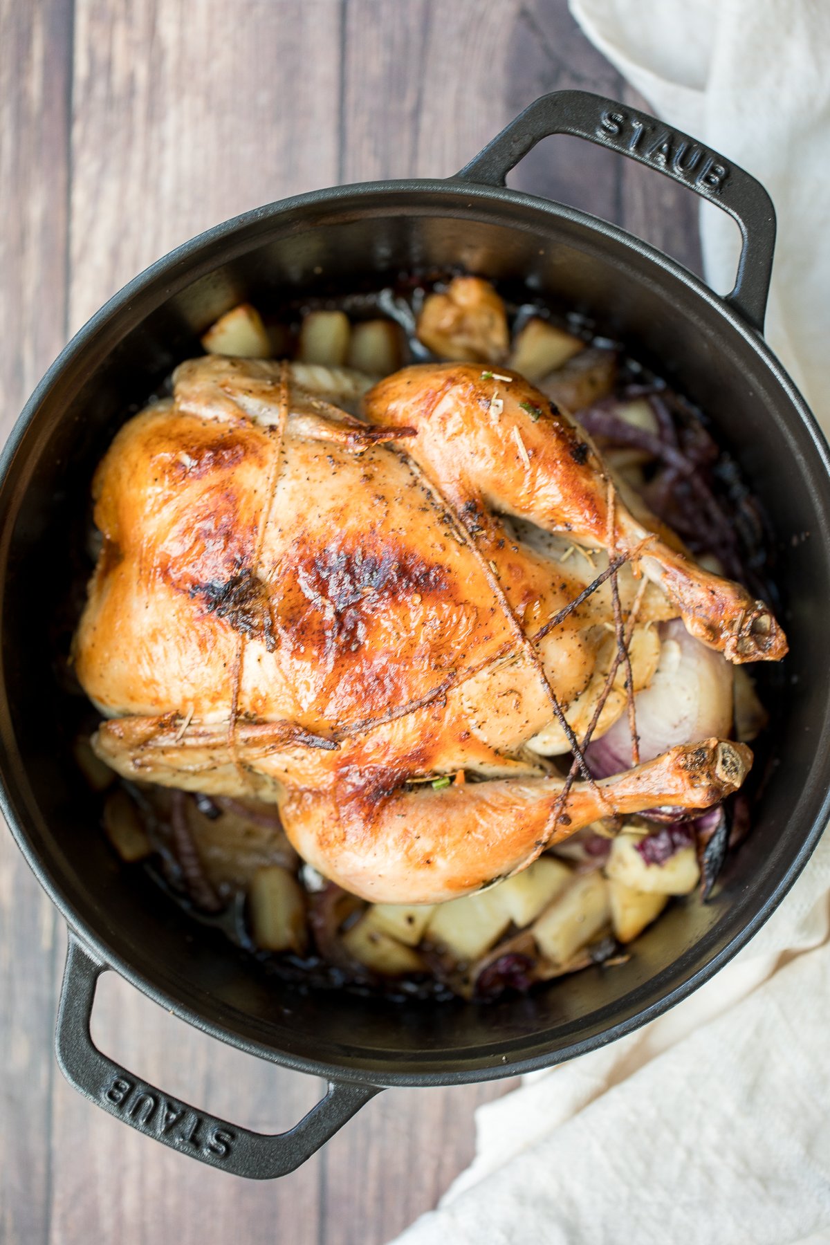 Easy Dutch oven whole roast chicken with the crispiest golden skin is juicy, tender and succulent and packed with flavour. Just takes 15 minutes to prep. | aheadofthyme.com