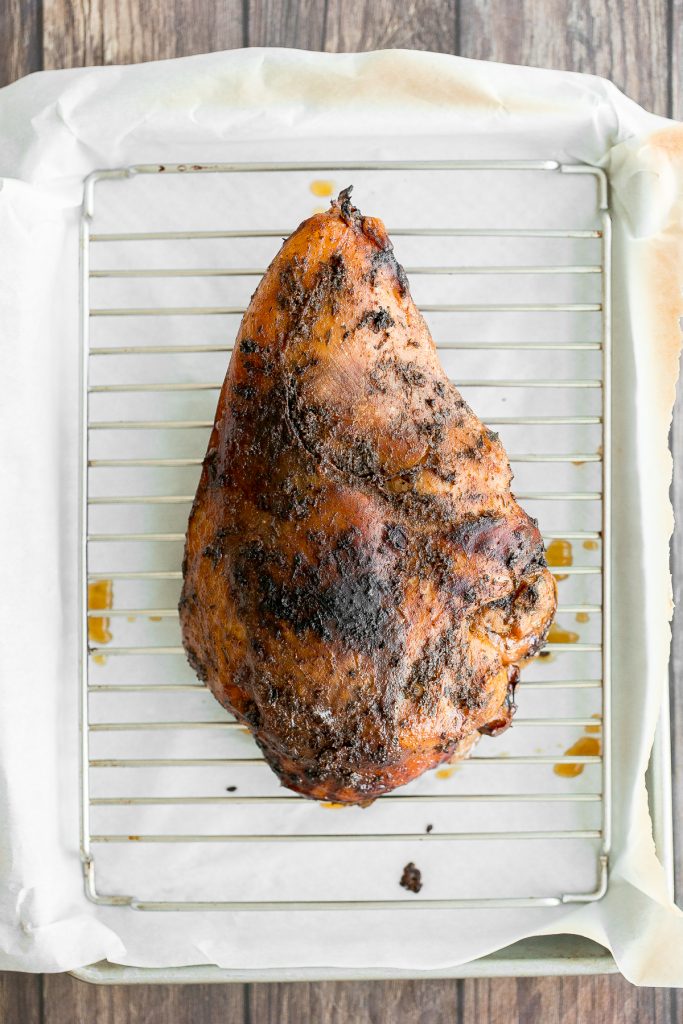 Soft, tender and juicy slow cooker turkey breast with the crispiest skin and fresh fall herbs is the easiest way to cook a turkey this holiday season. | aheadofthyme.com