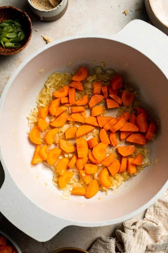 One pot Healthy Sweet Potato Soup is silky, creamy, and nourishing. Packed with cozy fall flavors, this vegan soup is ready in just 30 minutes. | aheadofthyme.com