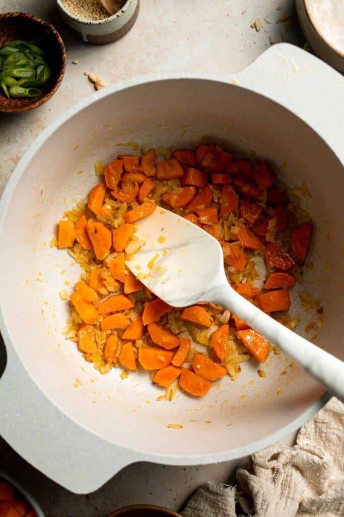 One pot Healthy Sweet Potato Soup is silky, creamy, and nourishing. Packed with cozy fall flavors, this vegan soup is ready in just 30 minutes. | aheadofthyme.com