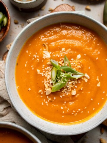One pot Healthy Sweet Potato Soup is silky, creamy, and nourishing. Packed with cozy fall flavors, this vegan soup is ready in just 30 minutes. | aheadofthyme.com