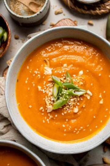 One pot Healthy Sweet Potato Soup is silky, creamy, and nourishing. Packed with cozy fall flavors, this vegan soup is ready in just 30 minutes. | aheadofthyme.com