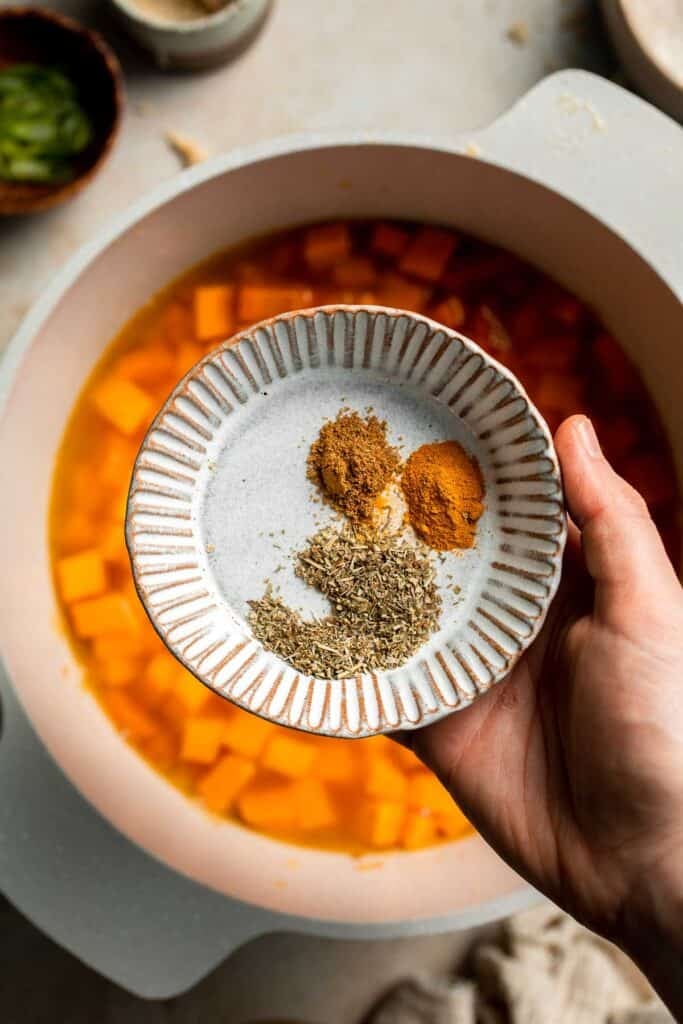 One pot Healthy Sweet Potato Soup is silky, creamy, and nourishing. Packed with cozy fall flavors, this vegan soup is ready in just 30 minutes. | aheadofthyme.com
