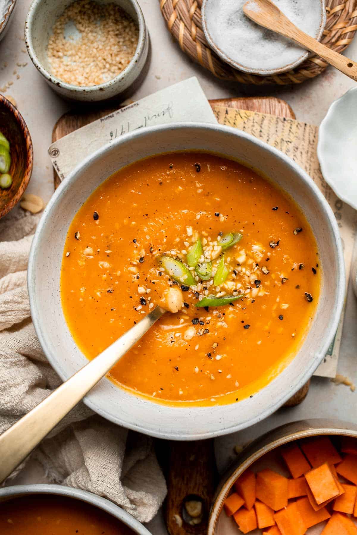 One pot Healthy Sweet Potato Soup is silky, creamy, and nourishing. Packed with cozy fall flavors, this vegan soup is ready in just 30 minutes. | aheadofthyme.com