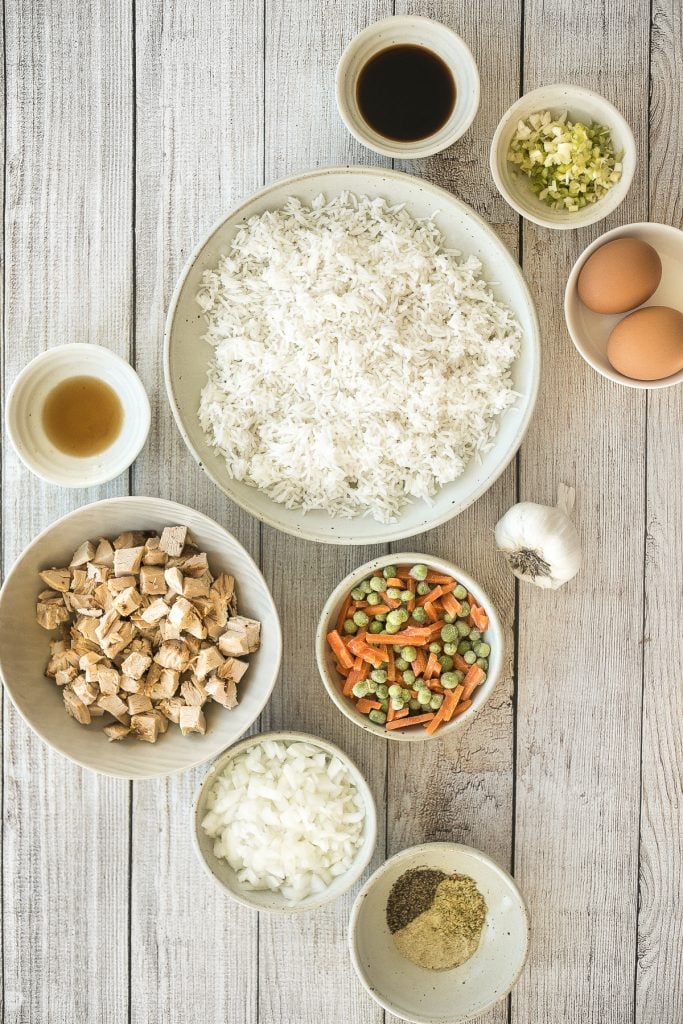 Leftover turkey fried rice with turkey, fluffy rice, scrambled eggs, vegetables, and classic Asian seasonings is a one skillet meal made in just 10 minutes. | aheadofthyme.com