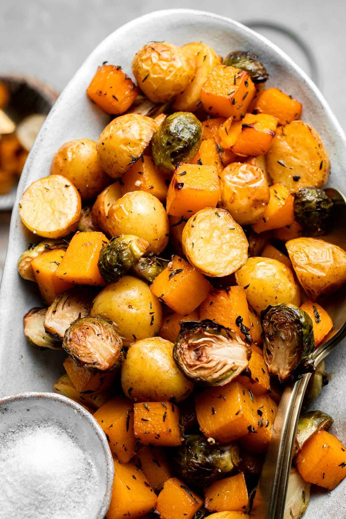 One pan roasted fall vegetables with seasonal produce is a cozy, stress-free side dish that’s perfect for Thanksgiving, holidays, or autumn dinners. | aheadofthyme.com