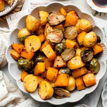 One pan roasted fall vegetables with seasonal produce is a cozy, stress-free side dish that’s perfect for Thanksgiving, holidays, or autumn dinners. | aheadofthyme.com