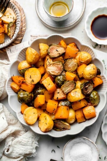 One pan roasted fall vegetables with seasonal produce is a cozy, stress-free side dish that’s perfect for Thanksgiving, holidays, or autumn dinners. | aheadofthyme.com