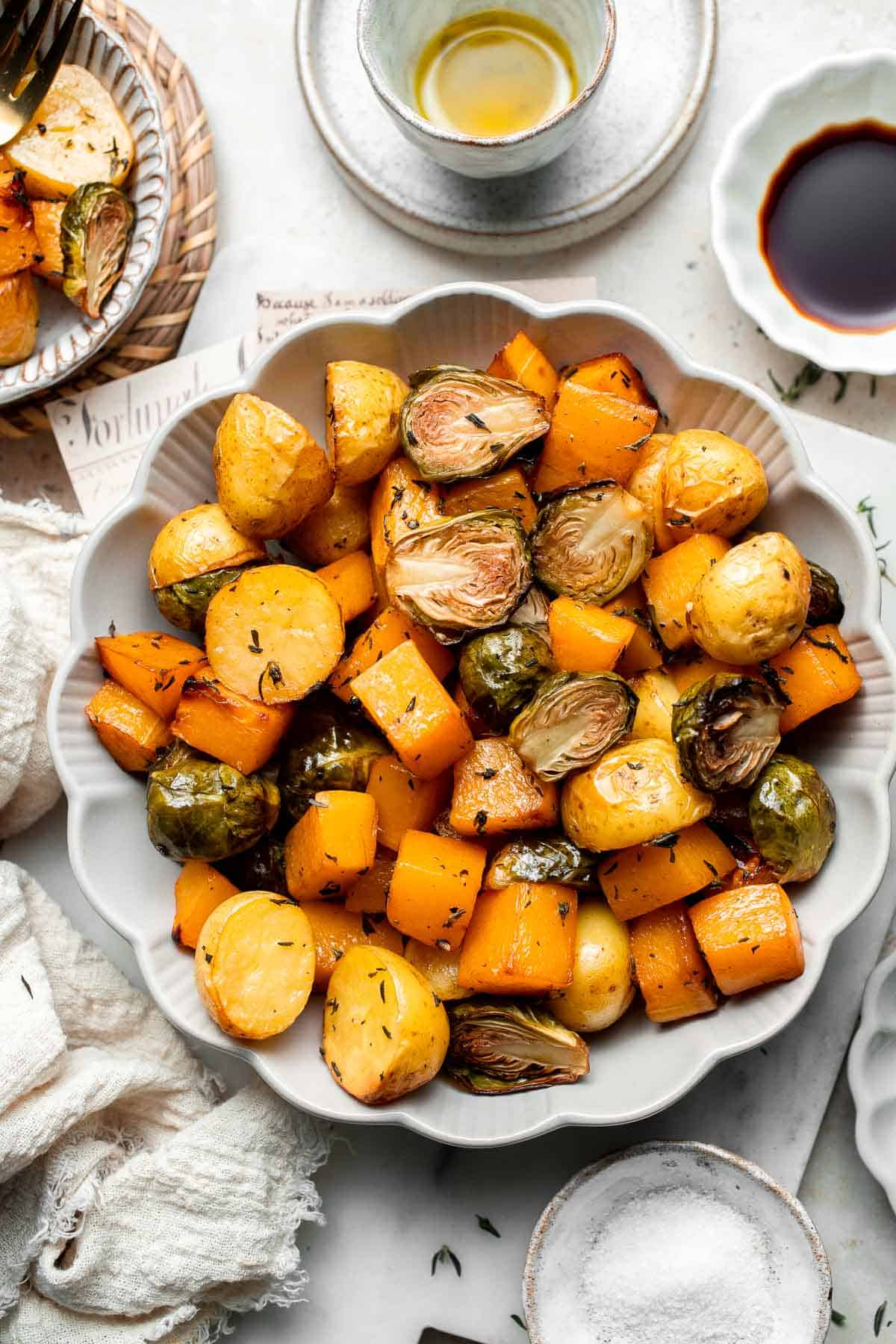 One pan roasted fall vegetables with seasonal produce is a cozy, stress-free side dish that’s perfect for Thanksgiving, holidays, or autumn dinners. | aheadofthyme.com