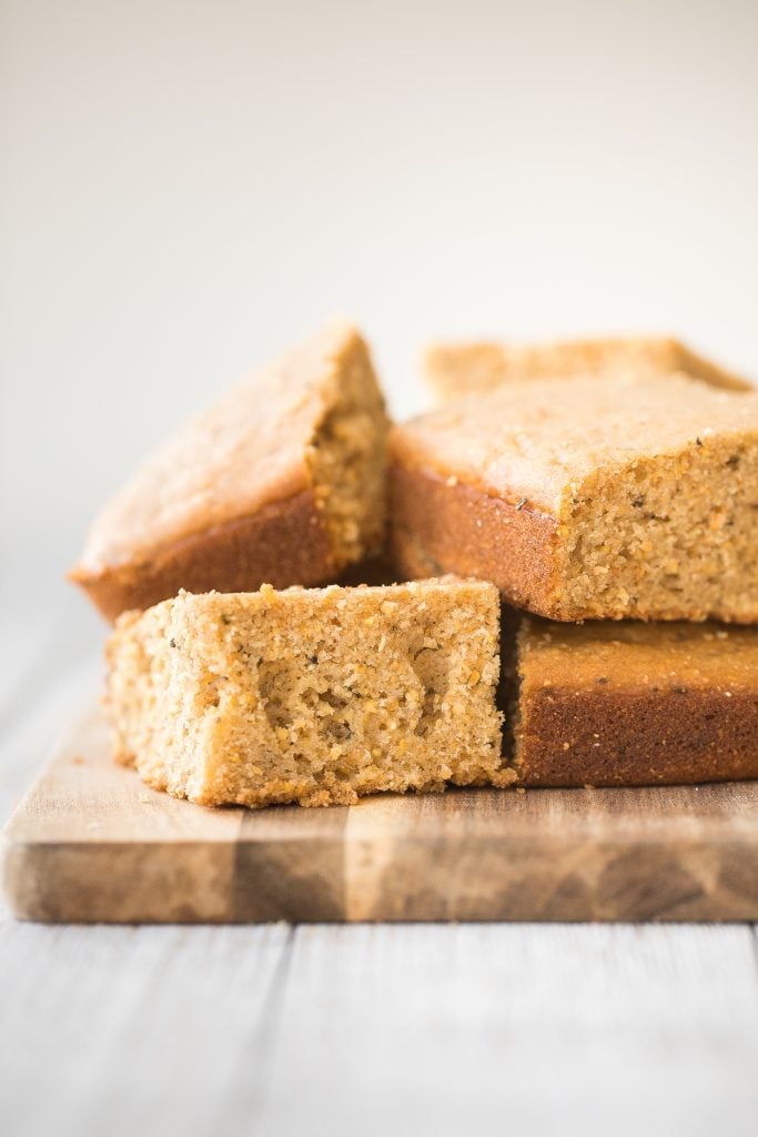 Sweet and savoury, buttery rosemary cornbread is soft and moist with golden crispy edges, flavourful and delicious, and so easy to make this holiday season. | aheadofthyme.com