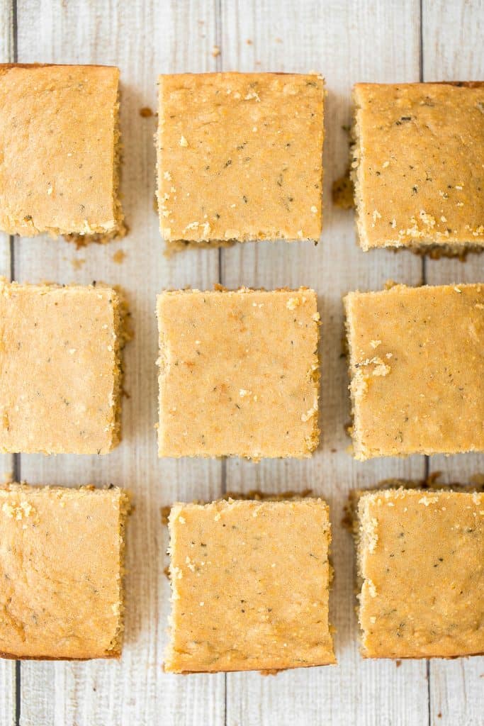 Sweet and savoury, buttery rosemary cornbread is soft and moist with golden crispy edges, flavourful and delicious, and so easy to make this holiday season. | aheadofthyme.com