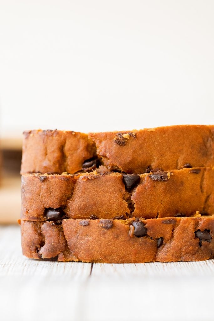 Soft and moist, small batch chocolate chip pumpkin bread is the easiest fall treat, packed with fall flavours of warm pumpkin spice, pumpkin, and chocolate. | aheadofthyme.com