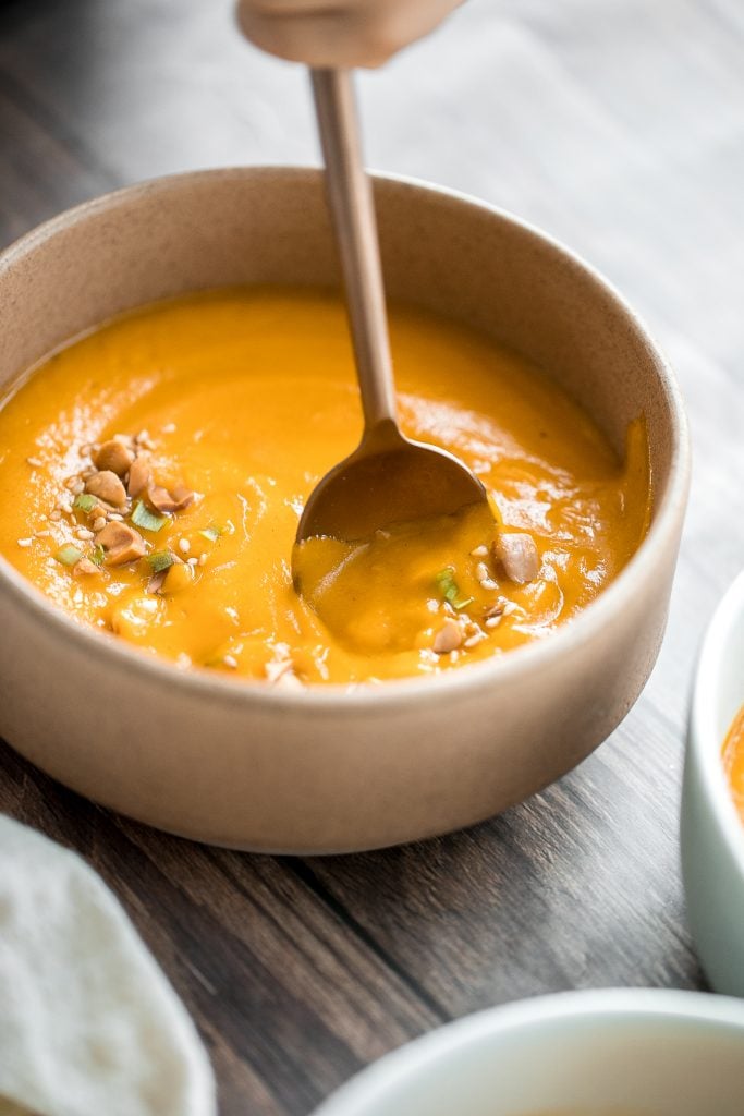 One pot sweet potato soup is super silky, creamy and vegan, and packed with fall flavours. Make this quick and easy fall and winter soup in 30 minutes. | aheadofthyme.com