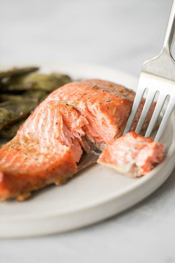 Quick and easy baked maple salmon is so delicious, flaky and flavourful with the perfect balance between sweet and savoury. The best weeknight dinner. | aheadofthyme.com