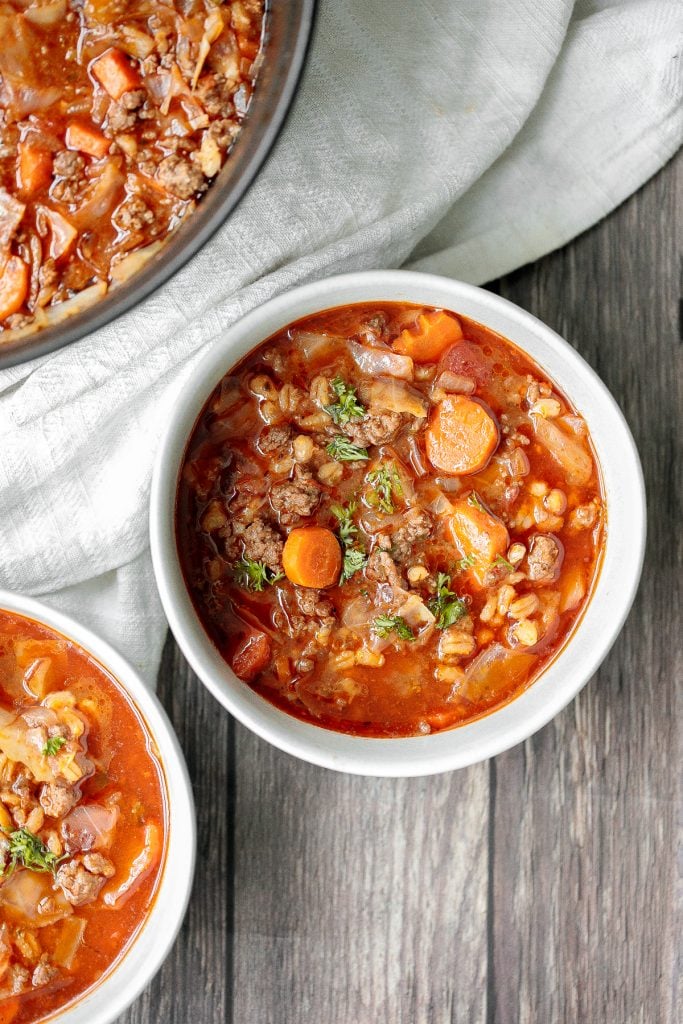 Hearty beef cabbage barley soup is wholesome, filling and flavourful. This one pot meal can be made ahead and is freezer-friendly. Prep it in 10 minutes. | aheadofthyme.com