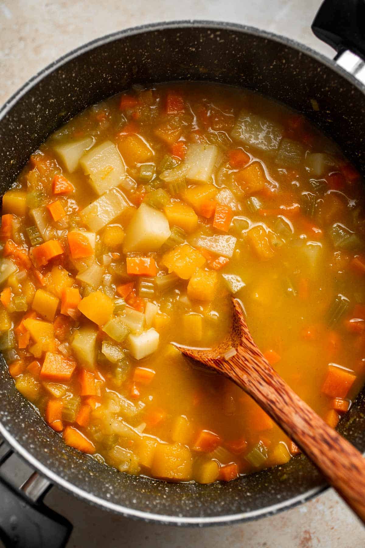 Butternut Squash Apple Soup is healthy and simple yet packed with so much flavour. Top this easy vegan soup with a layer of homemade toasted croutons. | aheadofthyme.com
