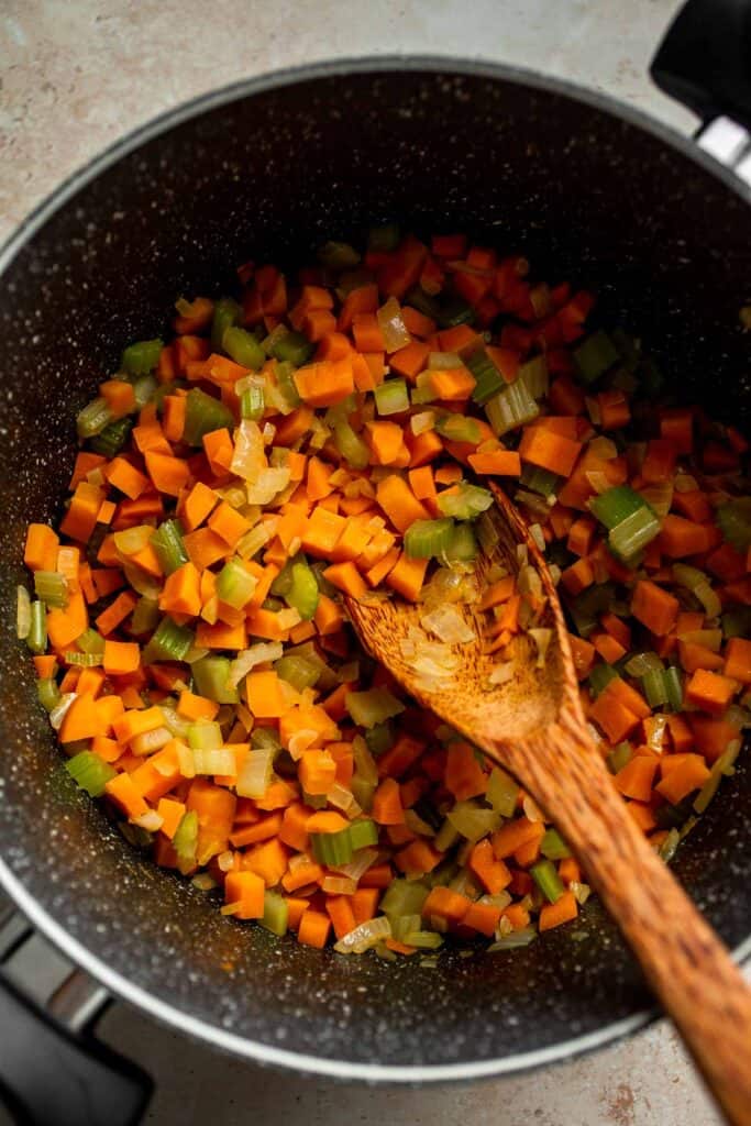 Butternut Squash Apple Soup is healthy and simple yet packed with so much flavour. Top this easy vegan soup with a layer of homemade toasted croutons. | aheadofthyme.com