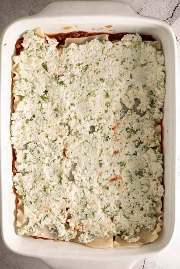 Easy Meat Lasagna is a classic, hearty, homemade pasta dish layered with beef sauce, ricotta, mozzarella, and parmesan — perfect for cozy family dinners. | aheadofthyme.com
