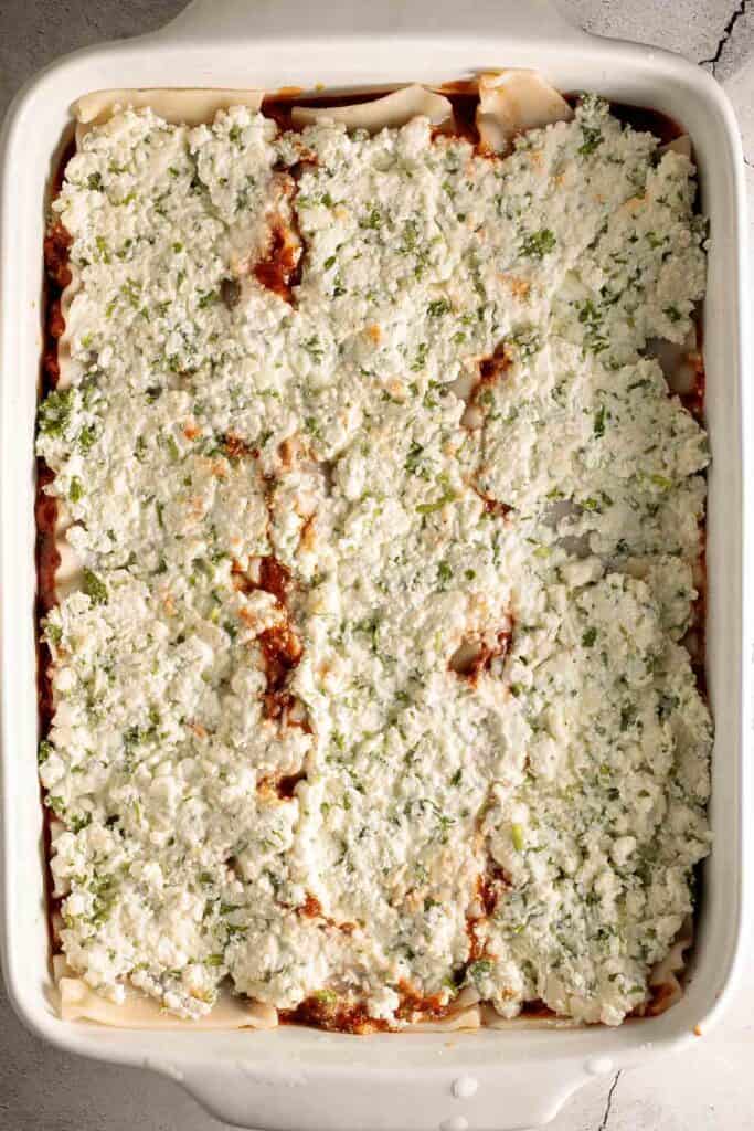 Easy Meat Lasagna is a classic, hearty, homemade pasta dish layered with beef sauce, ricotta, mozzarella, and parmesan — perfect for cozy family dinners. | aheadofthyme.com