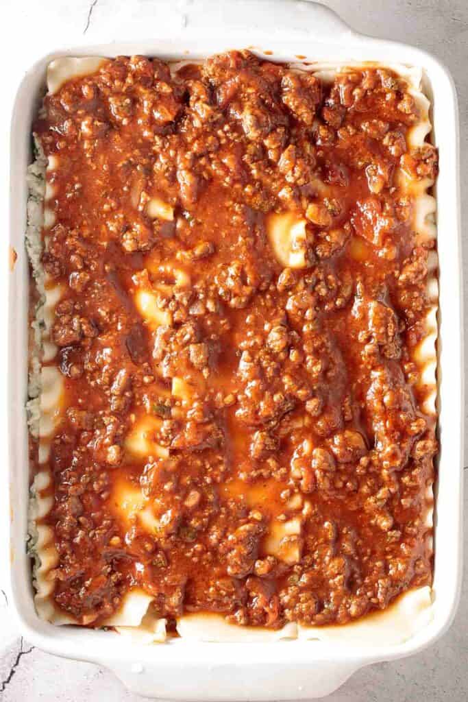Easy Meat Lasagna is a classic, hearty, homemade pasta dish layered with beef sauce, ricotta, mozzarella, and parmesan — perfect for cozy family dinners. | aheadofthyme.com