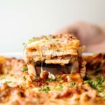 Easy Meat Lasagna is a classic, hearty, homemade pasta dish layered with beef sauce, ricotta, mozzarella, and parmesan - perfect for cozy family dinners. | aheadofthyme.com