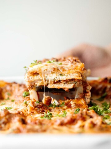 Easy Meat Lasagna is a classic, hearty, homemade pasta dish layered with beef sauce, ricotta, mozzarella, and parmesan - perfect for cozy family dinners. | aheadofthyme.com