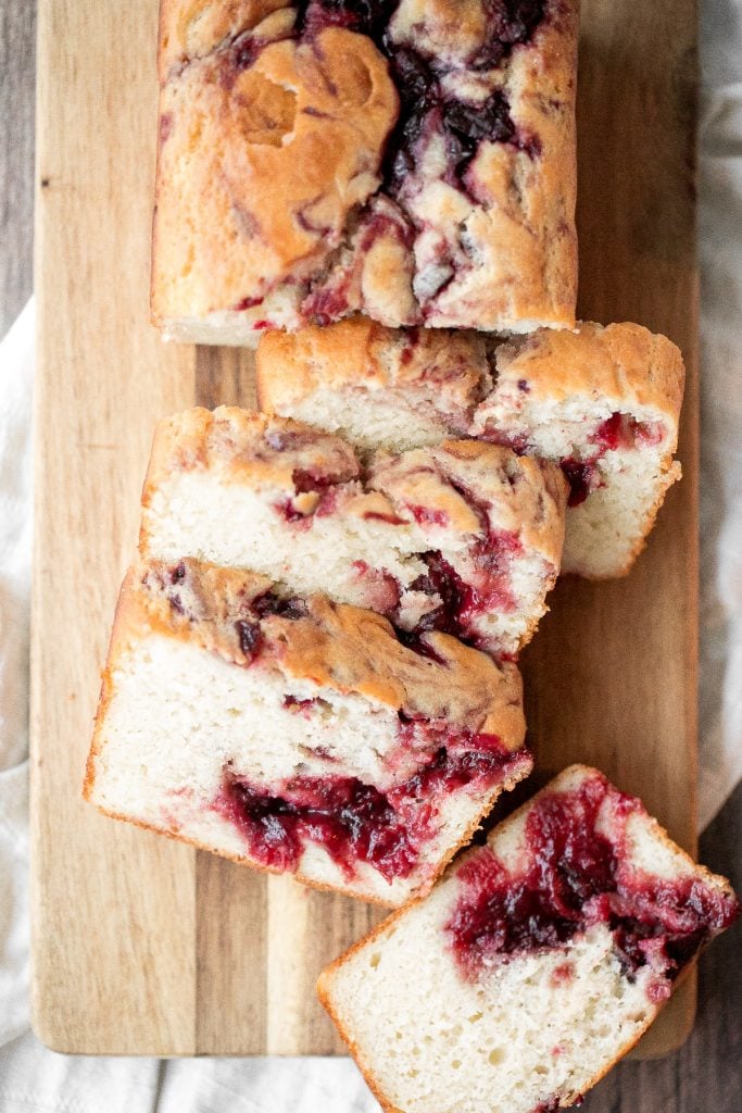Leftover cranberry sauce swirl pound cake is moist and tender with swirls of cranberry sauce for a sweet and tangy burst of flavour. So easy and delicious. | aheadofthyme.com