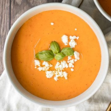 Make this silky smooth and creamy tomato potato soup in under 25 minutes. This gluten-free vegan soup is healthy and filling and the easiest weeknight meal. | aheadofthyme.com
