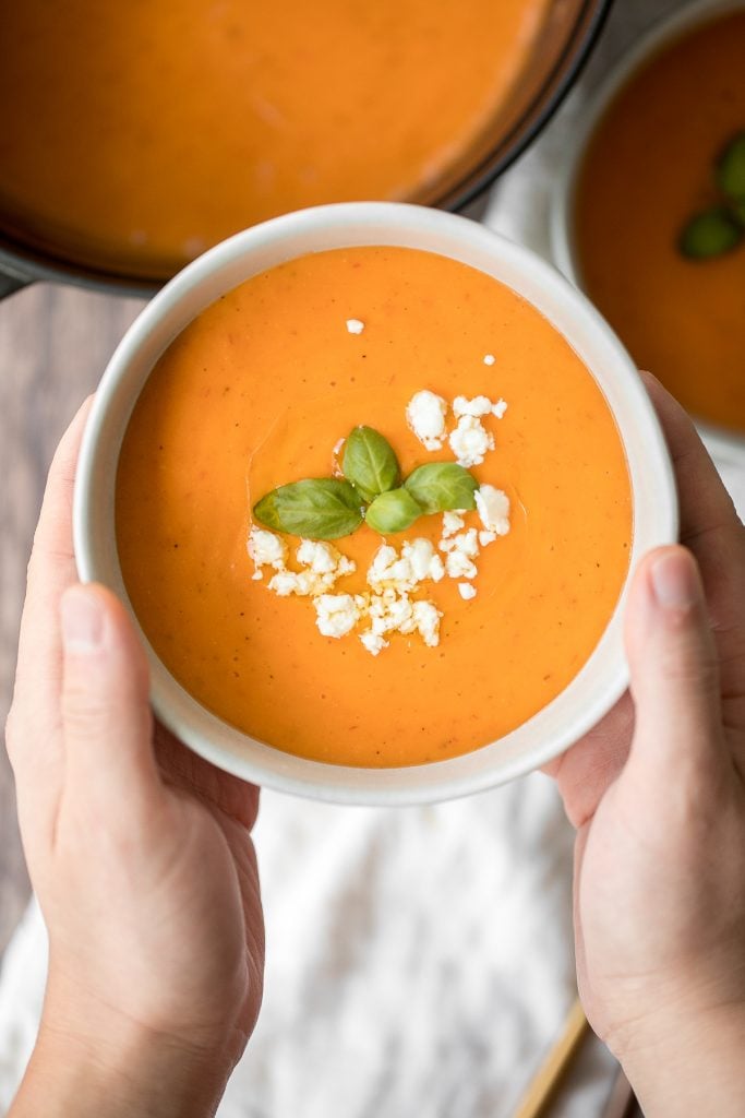 Make this silky smooth and creamy tomato potato soup in under 25 minutes. This gluten-free vegan soup is healthy and filling and the easiest weeknight meal. | aheadofthyme.com