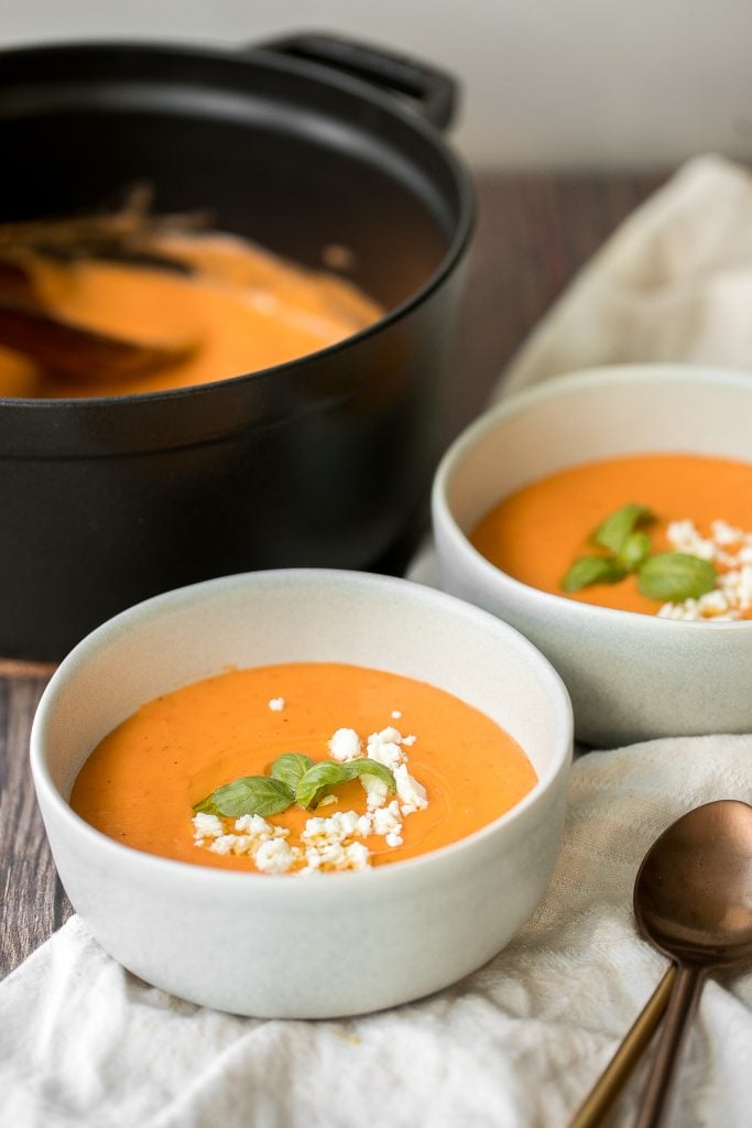 Make this silky smooth and creamy tomato potato soup in under 25 minutes. This gluten-free vegan soup is healthy and filling and the easiest weeknight meal. | aheadofthyme.com