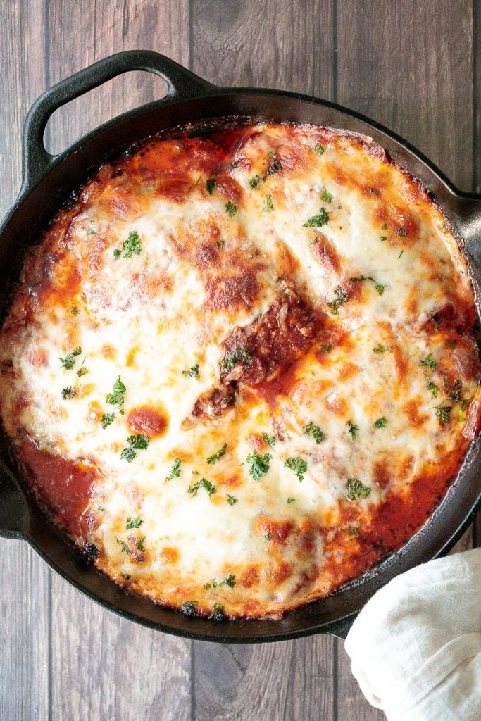 Easy chicken parmesan (parmigiana) with crispy breaded chicken, tomato sauce, and melted mozzarella and parmesan cheese. The best comfort chicken dinner. | aheadofthyme.com