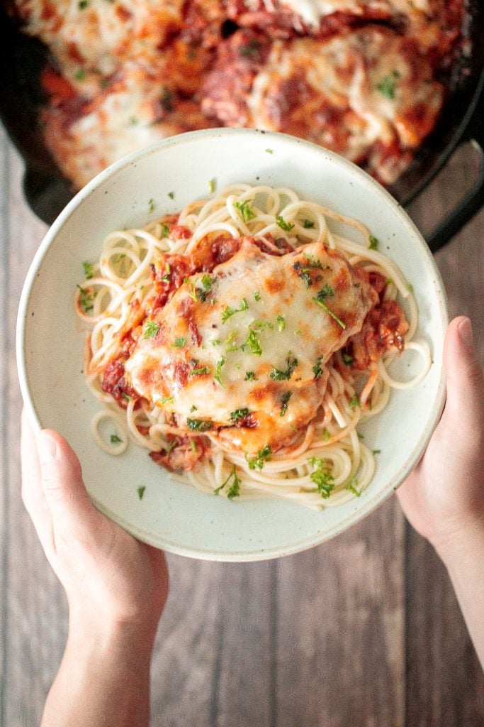 Easy chicken parmesan (parmigiana) with crispy breaded chicken, tomato sauce, and melted mozzarella and parmesan cheese. The best comfort chicken dinner. | aheadofthyme.com