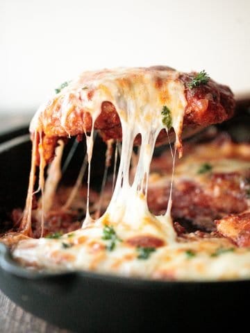 Easy chicken parmesan (parmigiana) with crispy breaded chicken, tomato sauce, and melted mozzarella and parmesan cheese. The best comfort chicken dinner. | aheadofthyme.com
