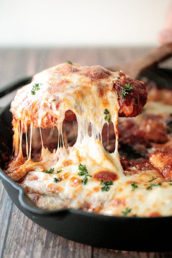 Easy chicken parmesan (parmigiana) with crispy breaded chicken, tomato sauce, and melted mozzarella and parmesan cheese. The best comfort chicken dinner. | aheadofthyme.com